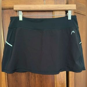 Black Head skort for golf/tennis. Size Medium